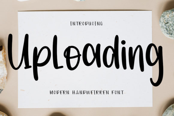 Uploading Typeface Review: A Classic Handwritten Font for Digital Branding